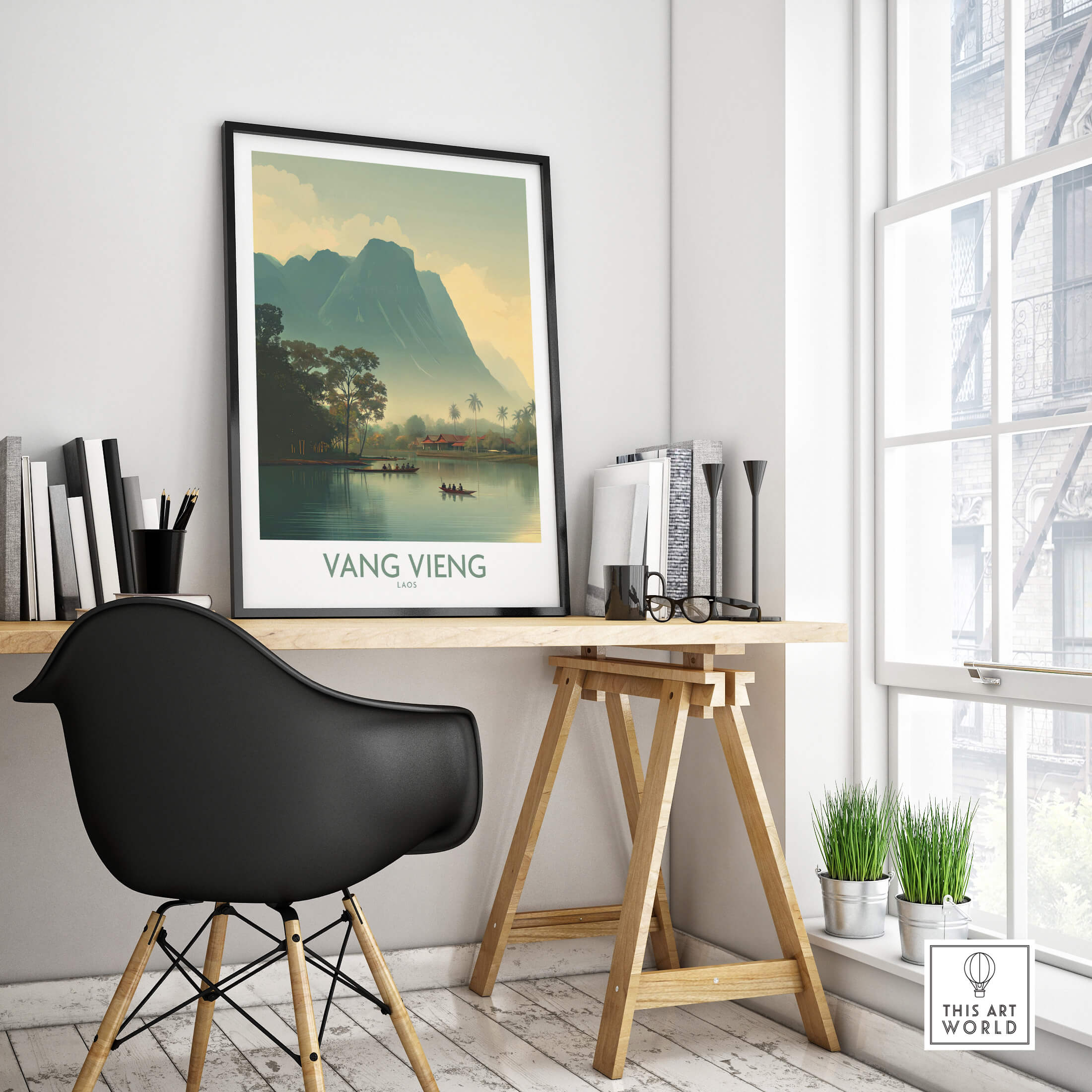 Vang Vieng Canvas Print | Misty Mountain Laos Poster displayed in a modern home office setting with plants and books.