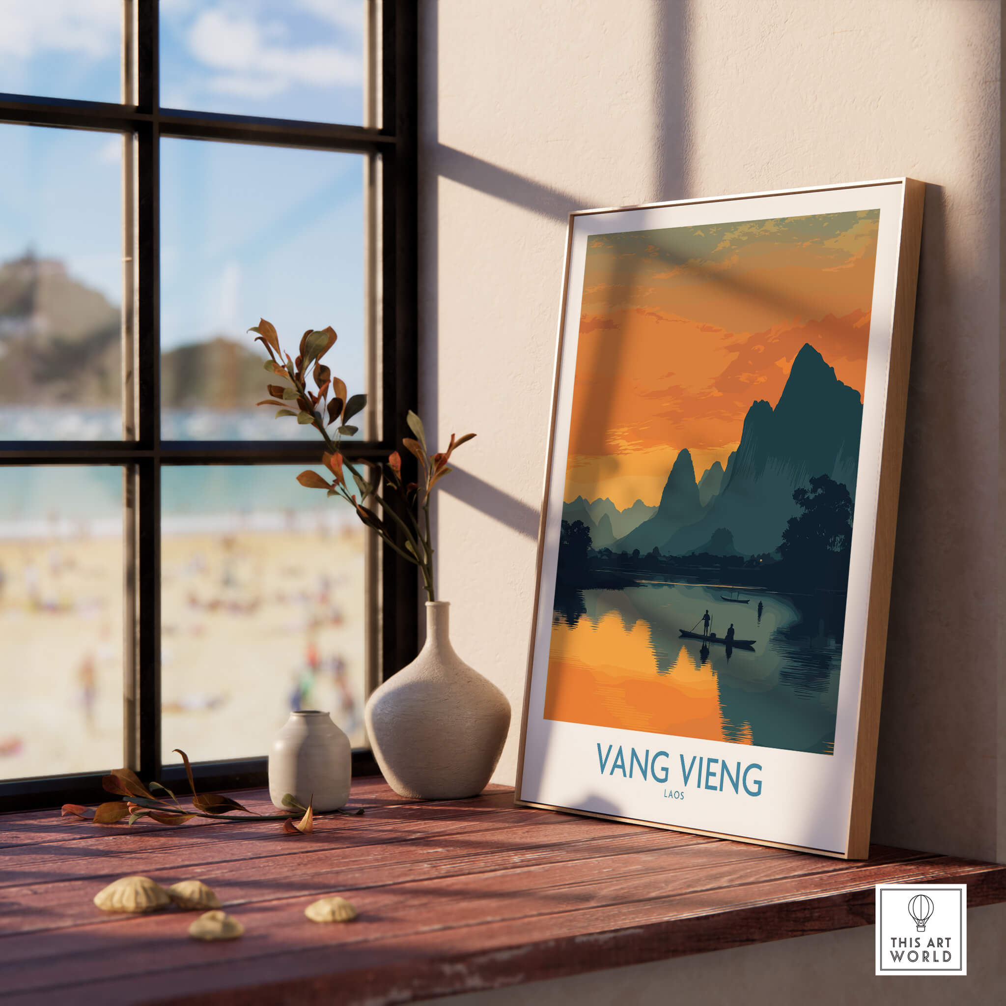 Vang Vieng Laos Canvas Print | Limestone Karst Mountain Landscape Poster on a wooden table by a window.