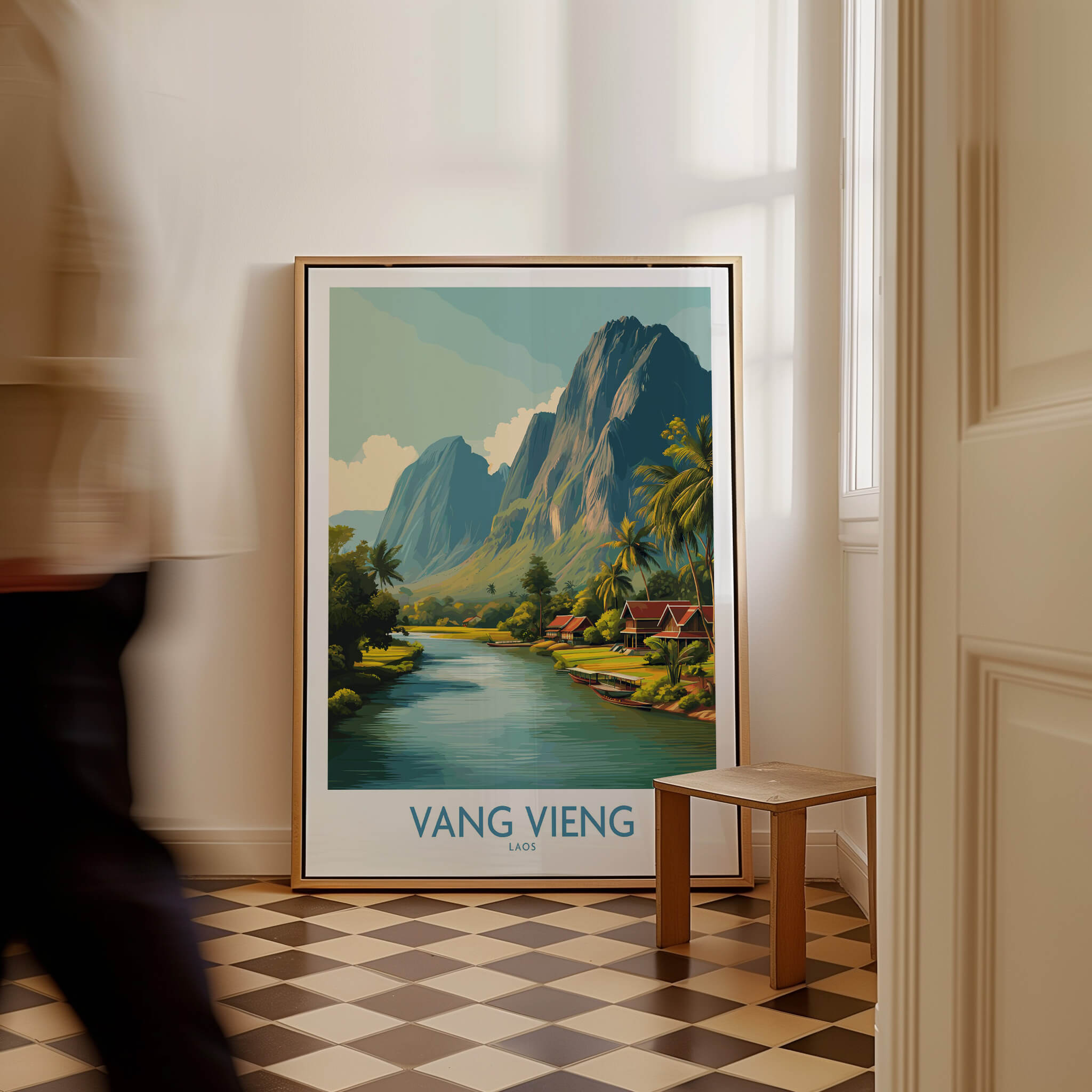 Vang Vieng Poster | Laos Village Canvas Print in a stylish interior with a framed scenic view of Vang Vieng.