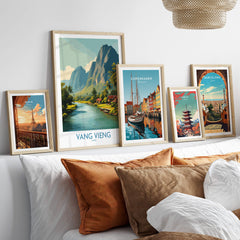 Vang Vieng Poster | Laos Village Canvas Print displayed among other travel-themed artworks in a cozy setting.