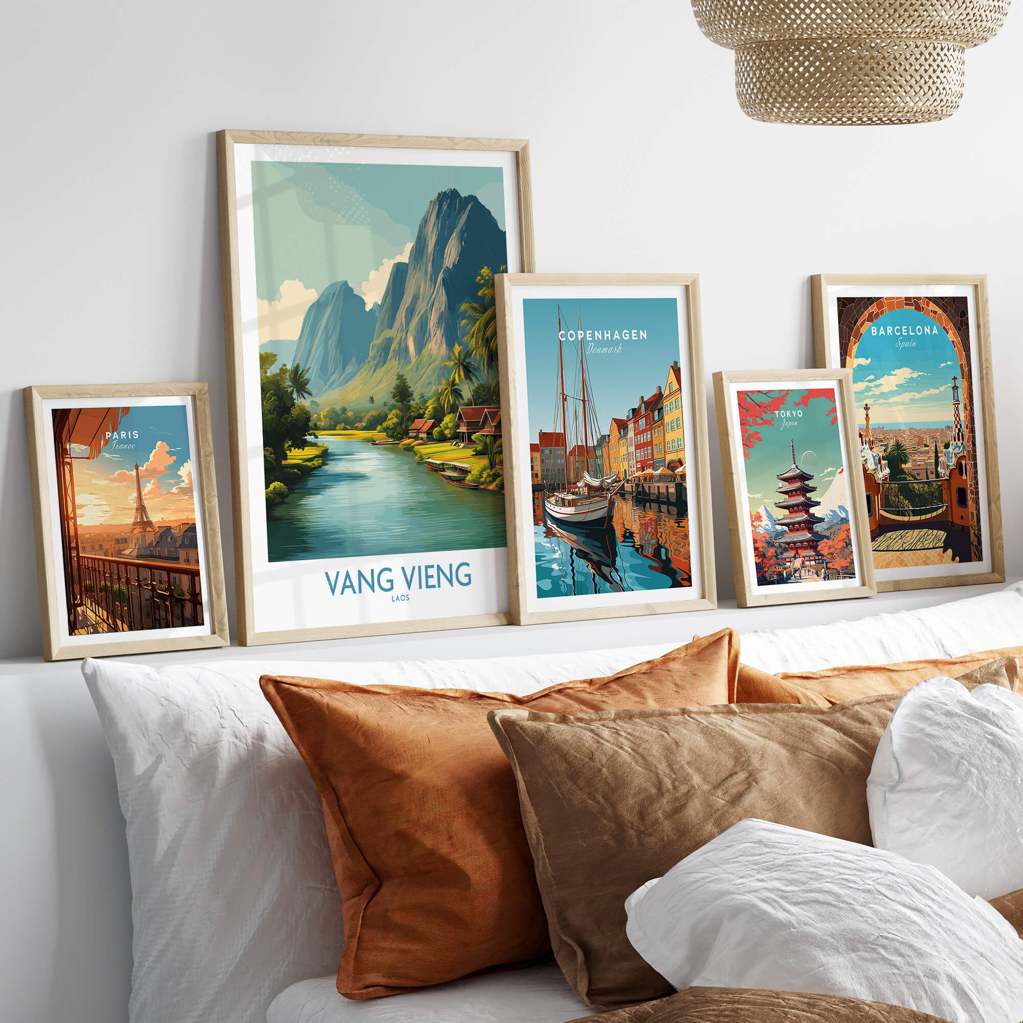 Vang Vieng Poster | Laos Village Canvas Print displayed among other travel-themed artworks in a cozy setting.