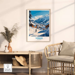 Verbier ski poster in a cozy room setting, showcasing stunning Swiss mountain scenery and inviting winter vibes.