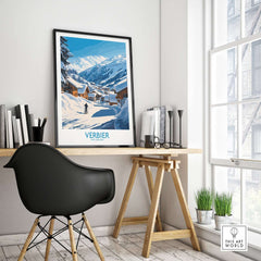 Verbier ski poster displayed in a modern workspace, showcasing snowy slopes and scenic mountains in Switzerland.