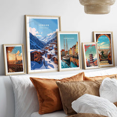 Framed Verbier Travel Print displays stunning ski resort scene amidst a stylish interior decor arrangement.