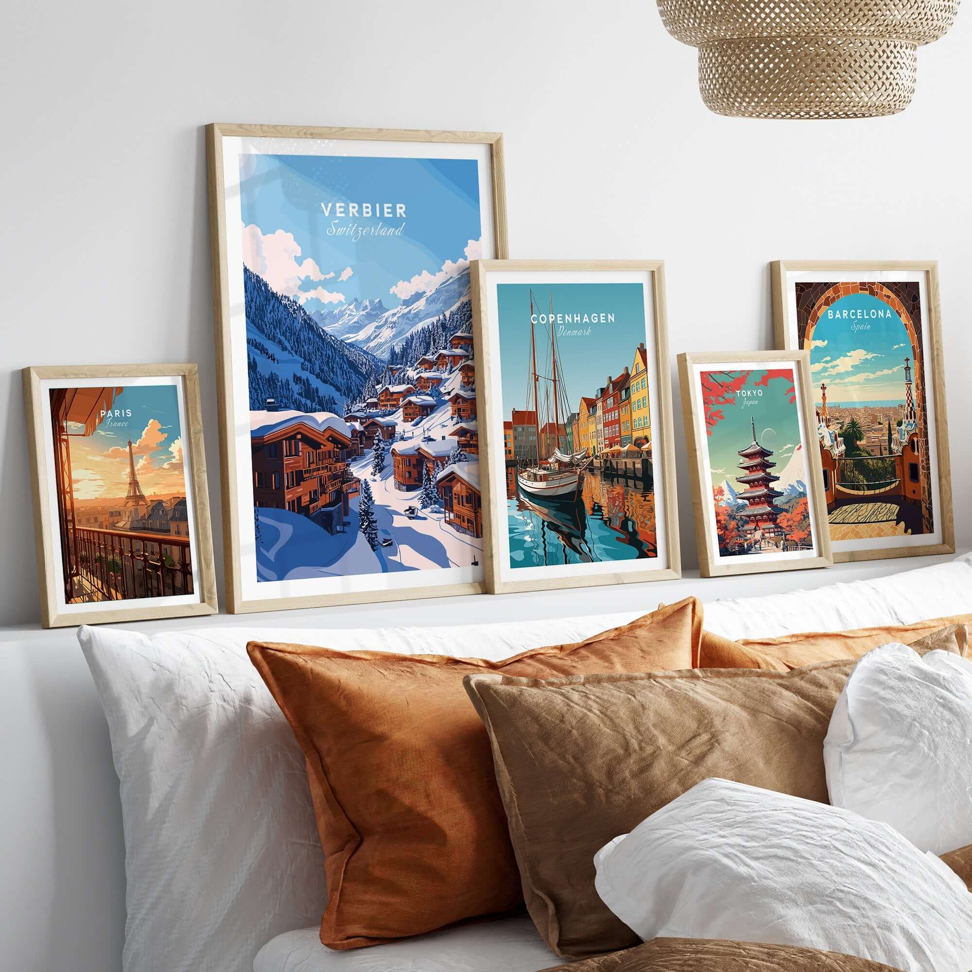 Framed Verbier Travel Print displays stunning ski resort scene amidst a stylish interior decor arrangement.