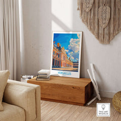 Versailles Poster France displayed on a stylish wooden table with a cozy interior setting.