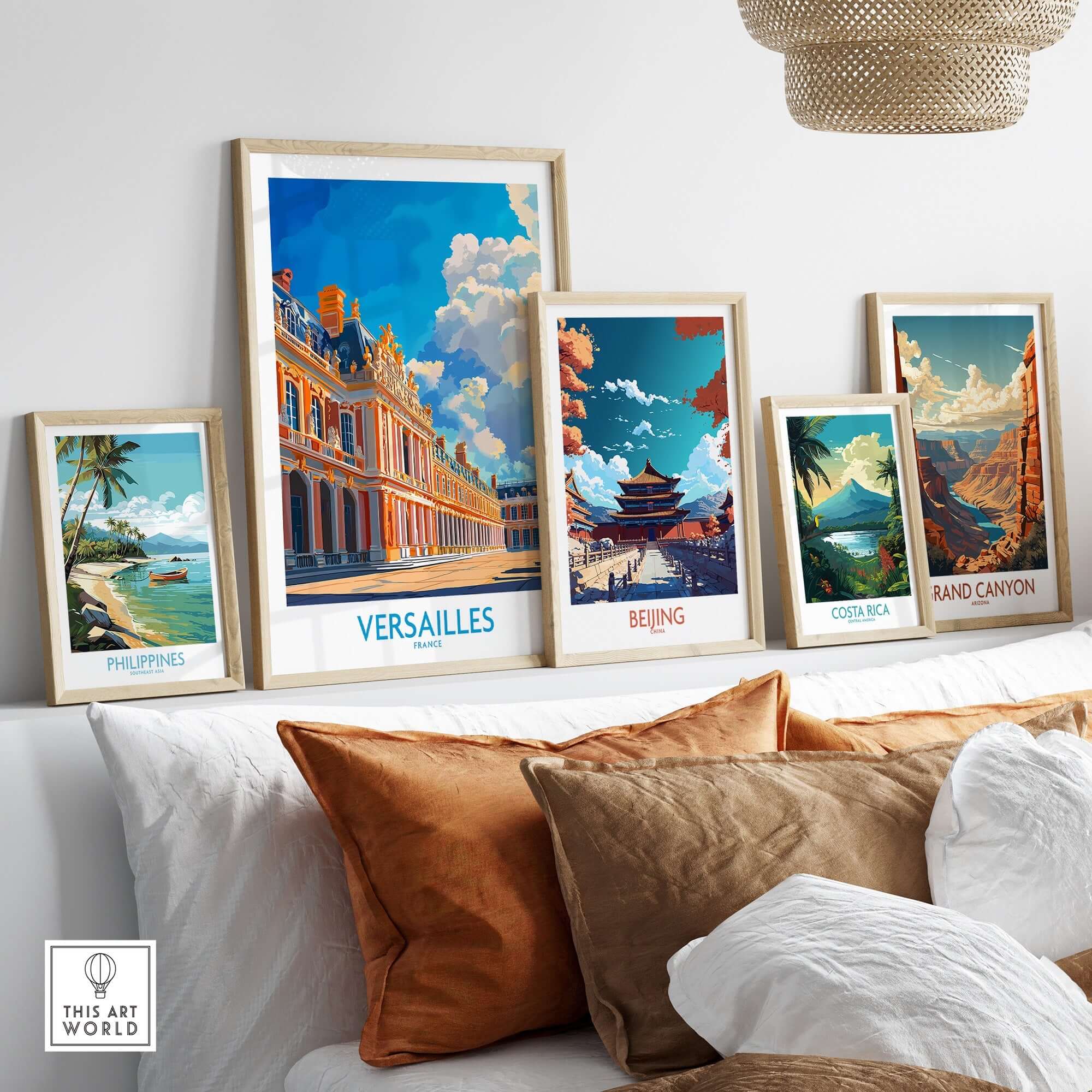 Versailles Poster France displayed among other travel posters on a cozy sofa, showcasing famous destinations.