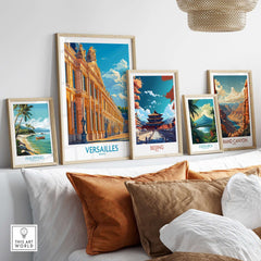 Versailles Wall Art Print displayed among travel-inspired artwork on a stylish sofa, enhancing home decor.