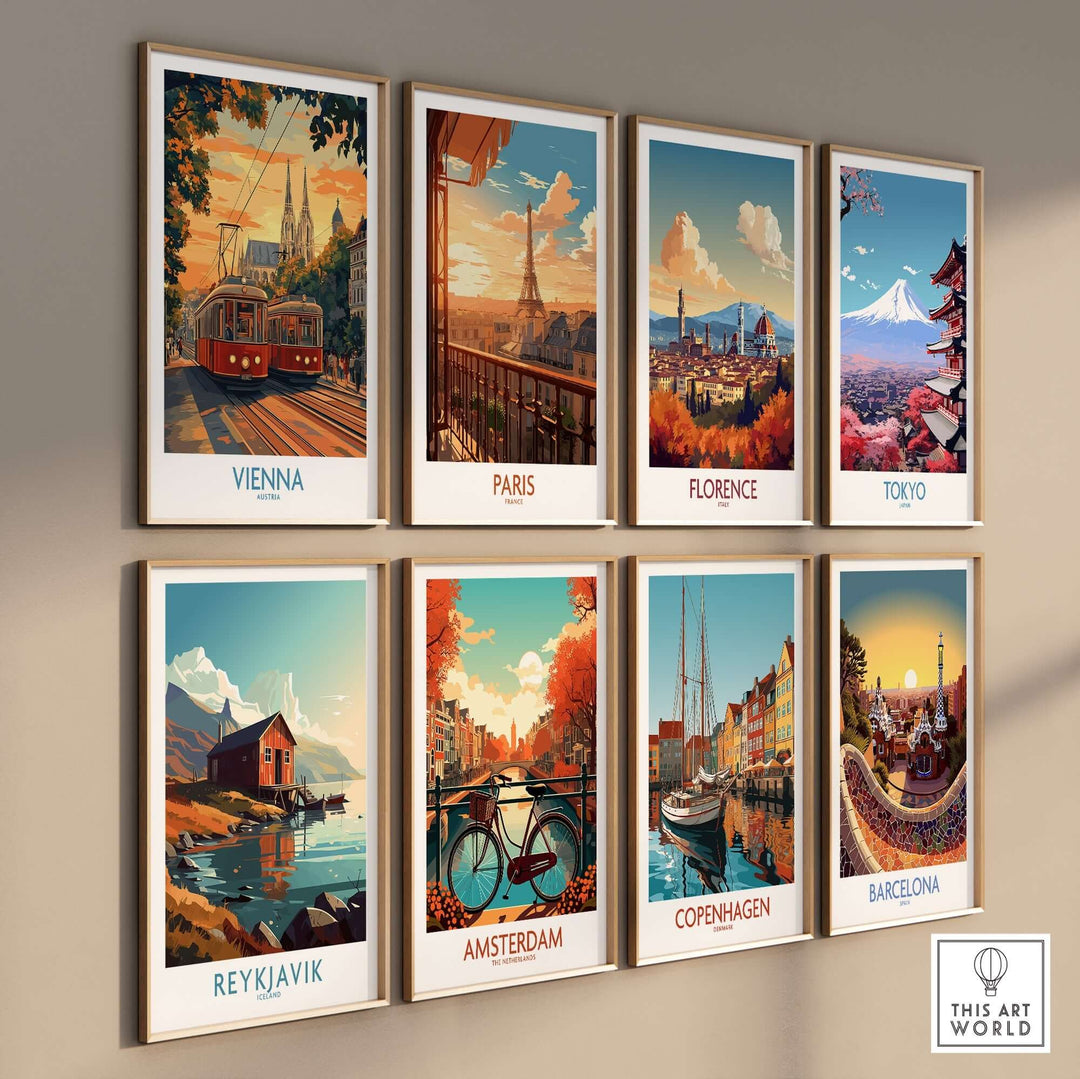 Wall of framed travel prints featuring landmarks from Vienna, Paris, Florence, Tokyo, Reykjavik, Amsterdam, Copenhagen, and Barcelona.