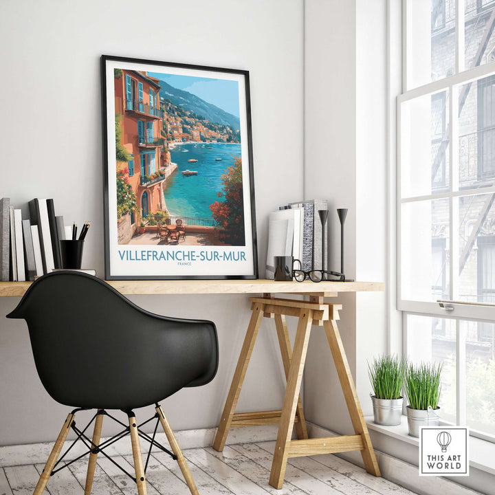 Villefranche-sur-Mer poster in a stylish home office, showcasing vibrant coastal village scenery and Mediterranean charm.