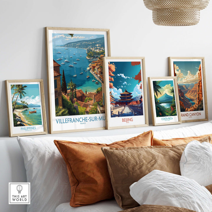 Collection of travel posters including Villefranche-sur-Mer, Beijing, and Costa Rica displayed in a stylish living room.