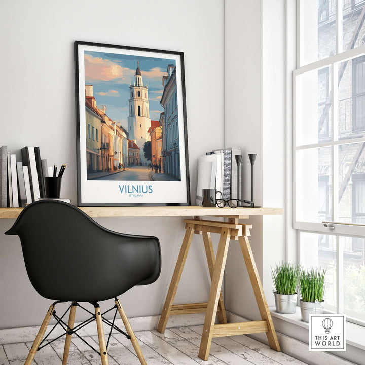 Vilnius Old Town poster displayed in a stylish workspace, showcasing Lithuania's architectural beauty and culture.