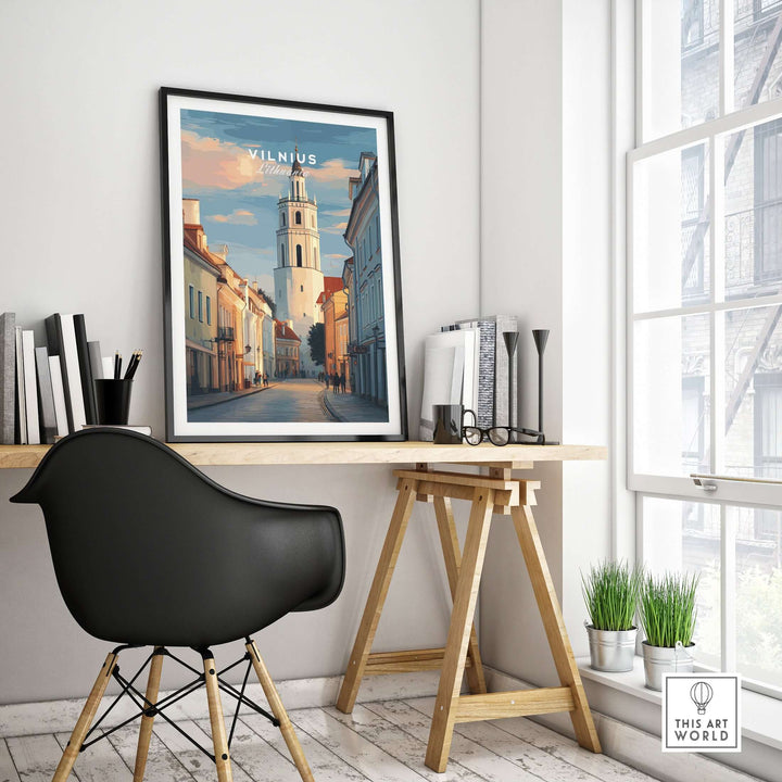 Vilnius poster showcasing a Lithuanian street scene, framed and displayed in a stylish workspace.