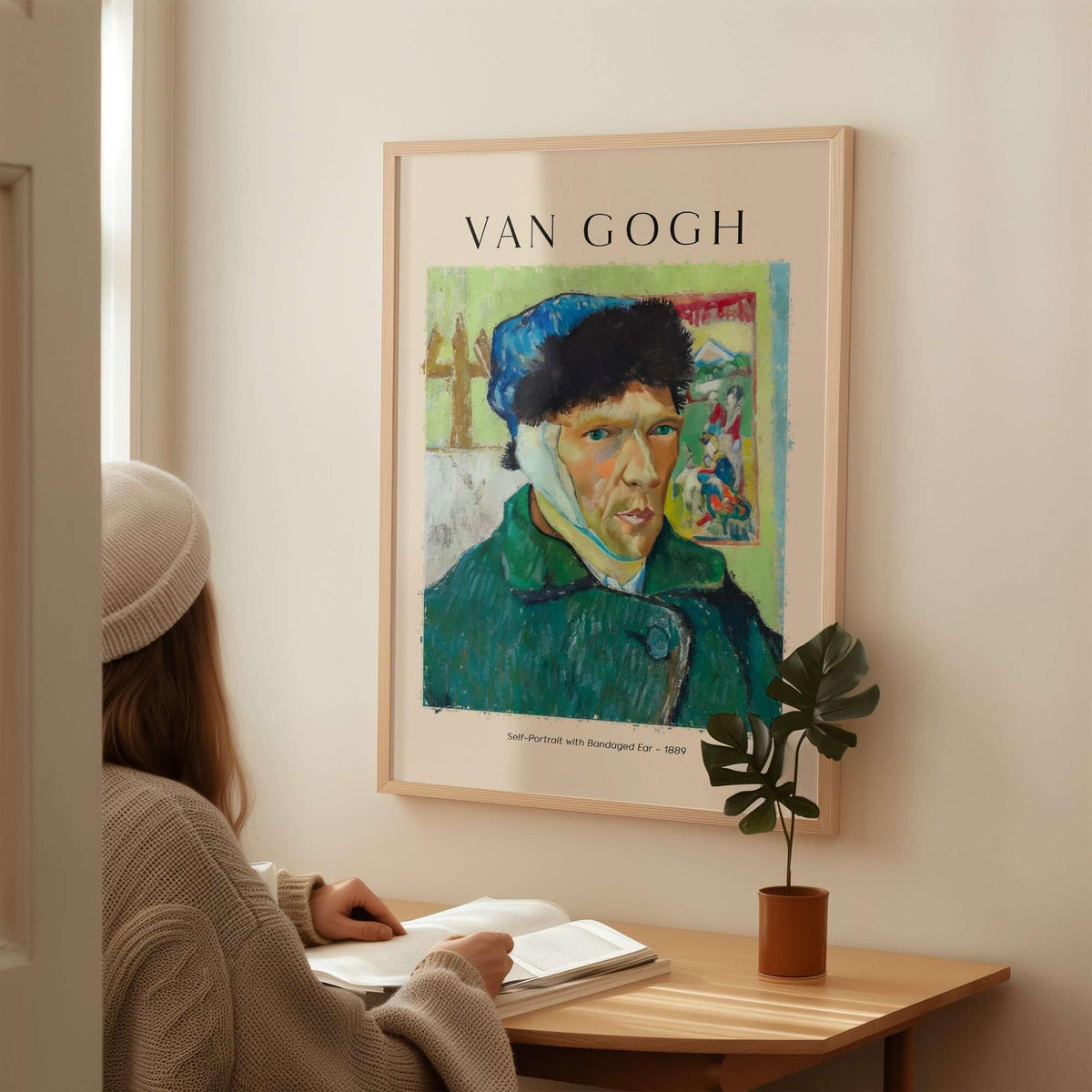 Vincent van Gogh Self Portrait Bandaged Ear 1889 Famous Art Print Poster Wall Decor displayed on wall near person