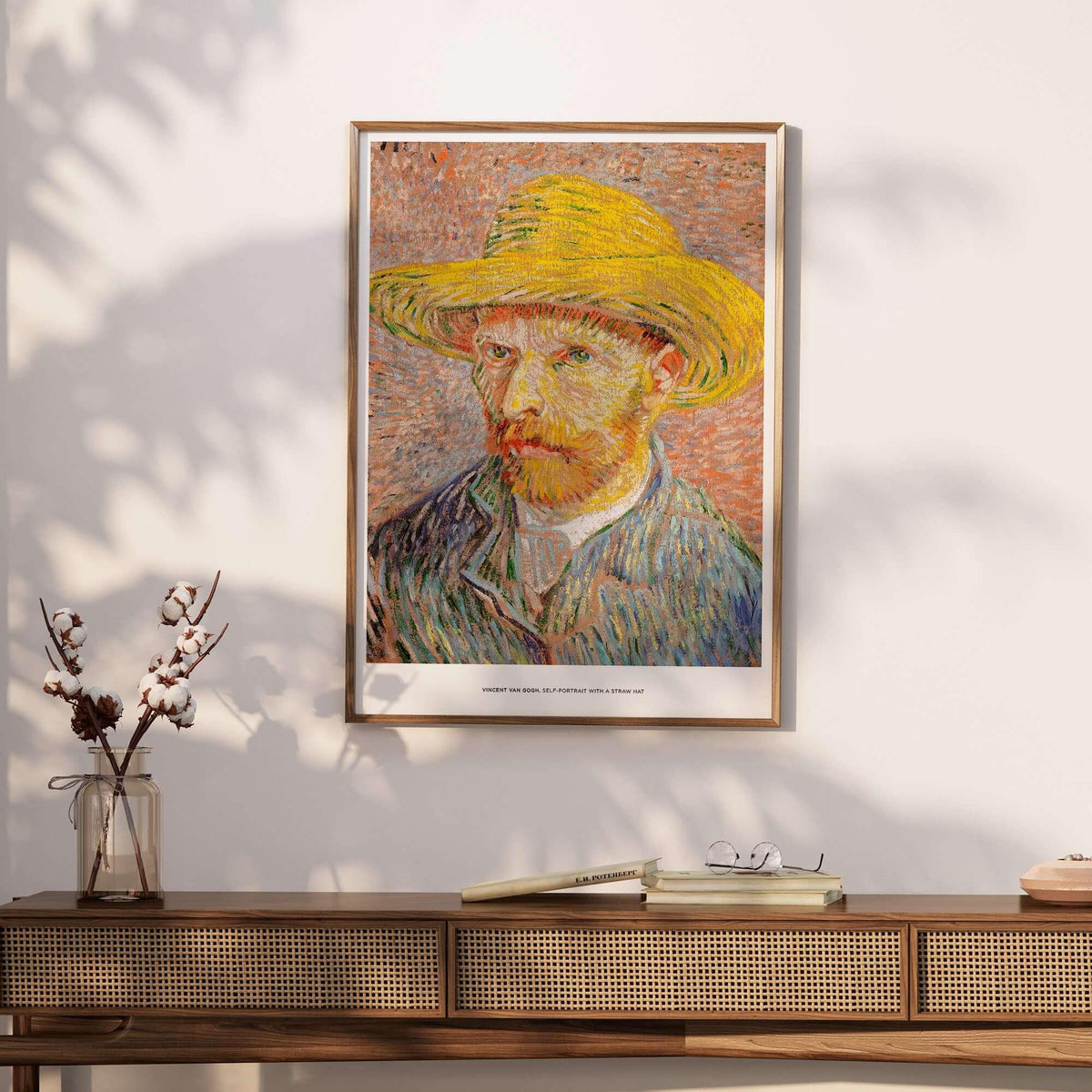 Vincent van Gogh Self Portrait Straw Hat Post-Impressionist Art Print Poster displayed on a wall in a stylish living room setting.