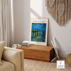 Vincent van Gogh Starry Night Over the Rhône 1888 Post Impressionist Landscape Poster Print displayed in a cozy living room.
