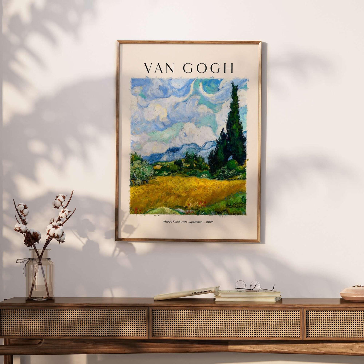 Vincent van Gogh Wheat Field with Cypresses 1889 Landscape Art Print Post Impressionist Poster displayed in a modern living room.