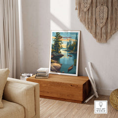 Voyageurs Print | American National Park Wall Decor featuring serene lakes and lush forests in a cozy interior setting.