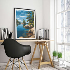 Voyageurs Poster | Nature Landscape Wall Art Print displayed in a modern workspace, featuring tranquil waters and lush greenery.