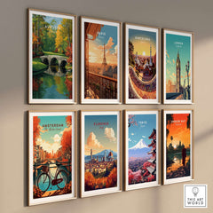A collection of framed city posters including Augusta, Paris, Barcelona, London, Amsterdam, Florence, Tokyo, and Angkor Wat.