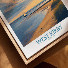 West Kirby England Canvas Print | Serene Coastline Sailboat Scene Poster displayed on a wooden surface.