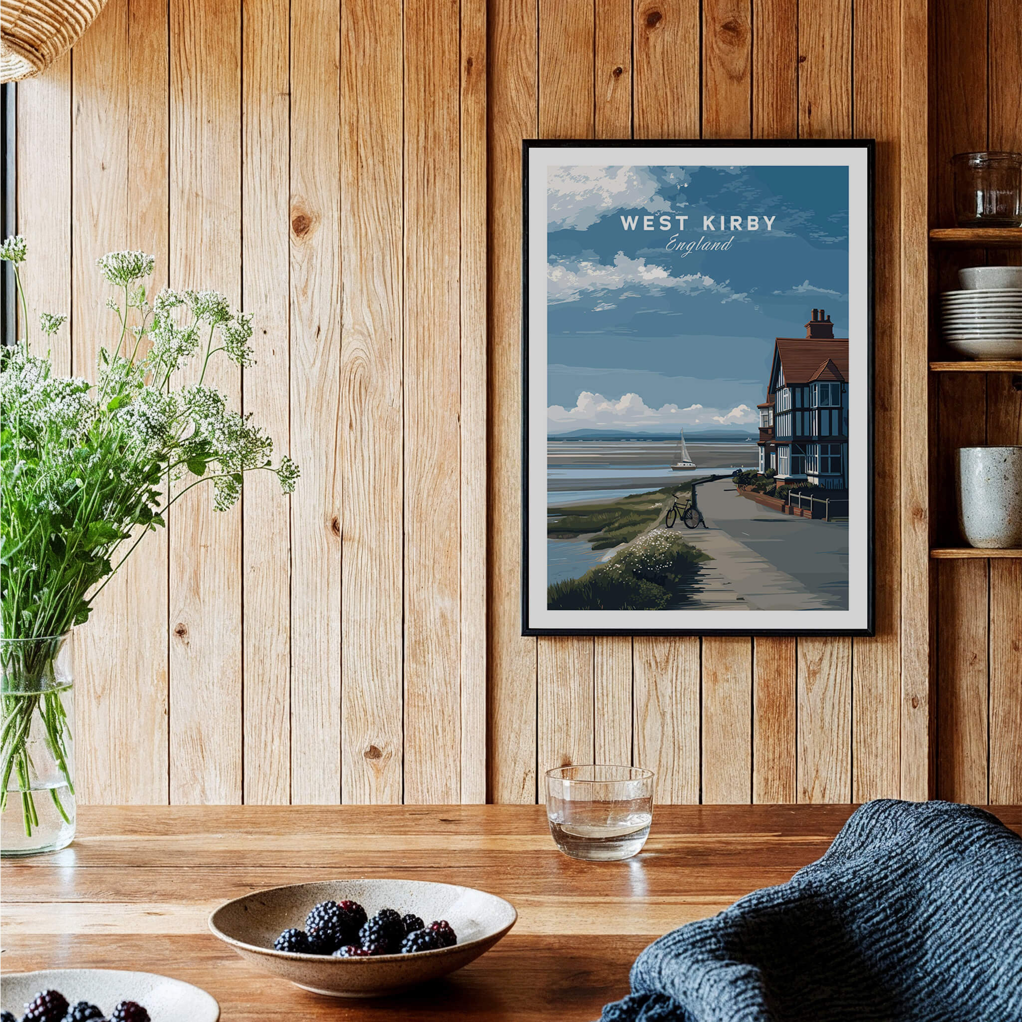 West Kirby Print England Travel Poster framed in a cozy interior, showcasing the beauty of the Wirral coastal landscape.