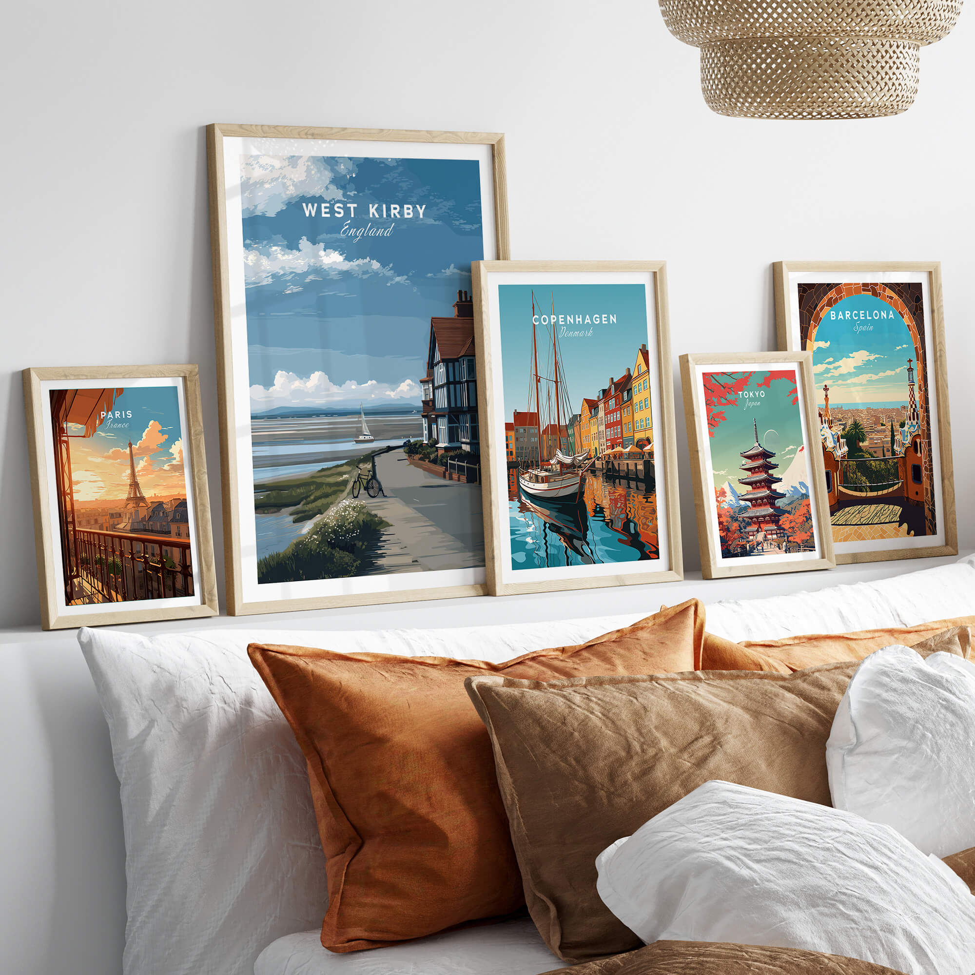 West Kirby Print England Travel Poster displayed among various travel art prints in a stylish living room setting.