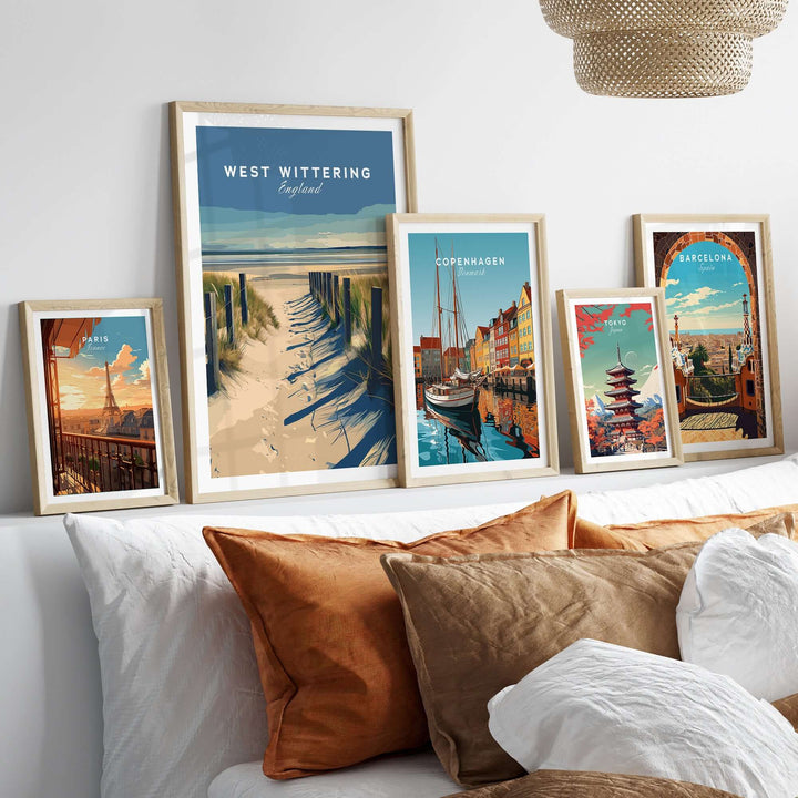 West Wittering poster framed among other city prints, enhancing coastal home decor in a stylish interior setting.