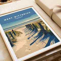 West Wittering Poster - Chichester England Print - Coastal Home Decor displayed on a table with beach scene design.