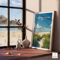 West Wittering Poster - UK Travel Print - Minimalist Coastal Home Decor displayed on a windowsill with beach view.
