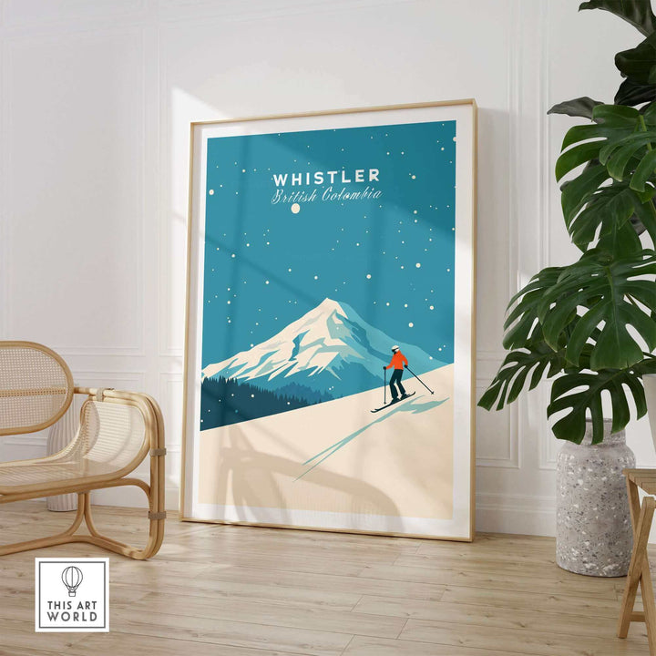 Whistler Ski Poster featuring a skier on snowy slopes with mountain backdrop, framed and displayed in a modern room with plants.