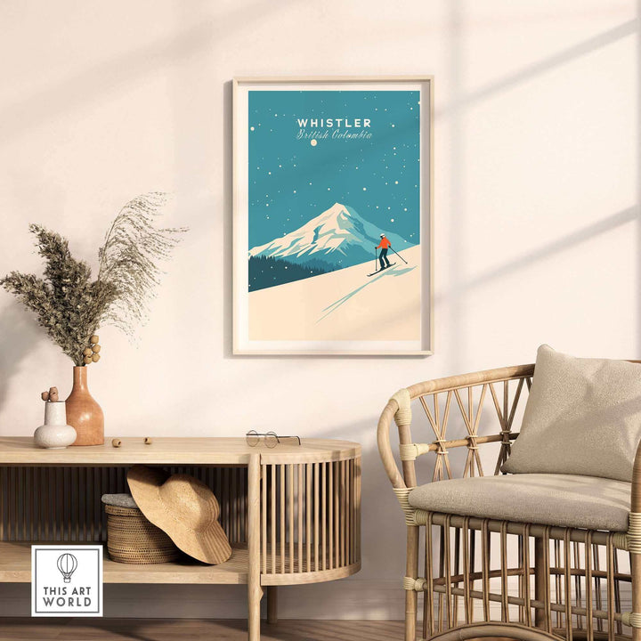 Whistler Ski Poster featuring a skier on a snowy mountain, framed and displayed in a cozy room setting with wicker furniture.