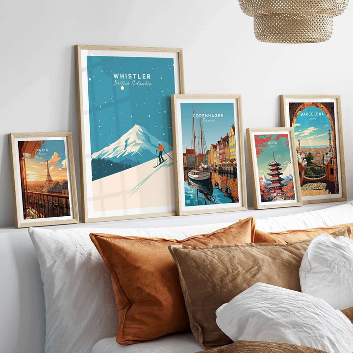 Whistler Ski Poster displayed among travel-themed posters on a stylish shelf