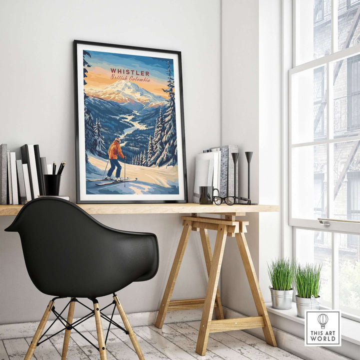 Whistler travel poster showcasing skiing in British Columbia, displayed in a modern living room setting with a stylish chair.