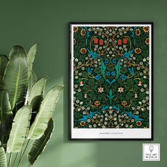 Exhibition Art Print William Morris Tulip Famous Pattern Arts Crafts Floral Poster Wall Art displayed on a green wall with plants.