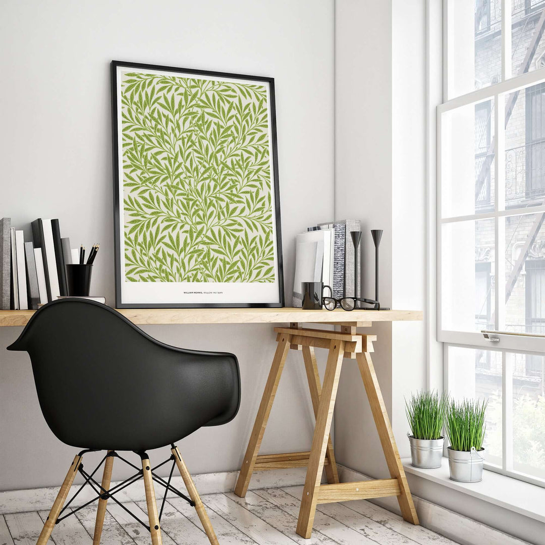 William Morris Willow Pattern green botanical art print displayed in a stylish interior workspace.