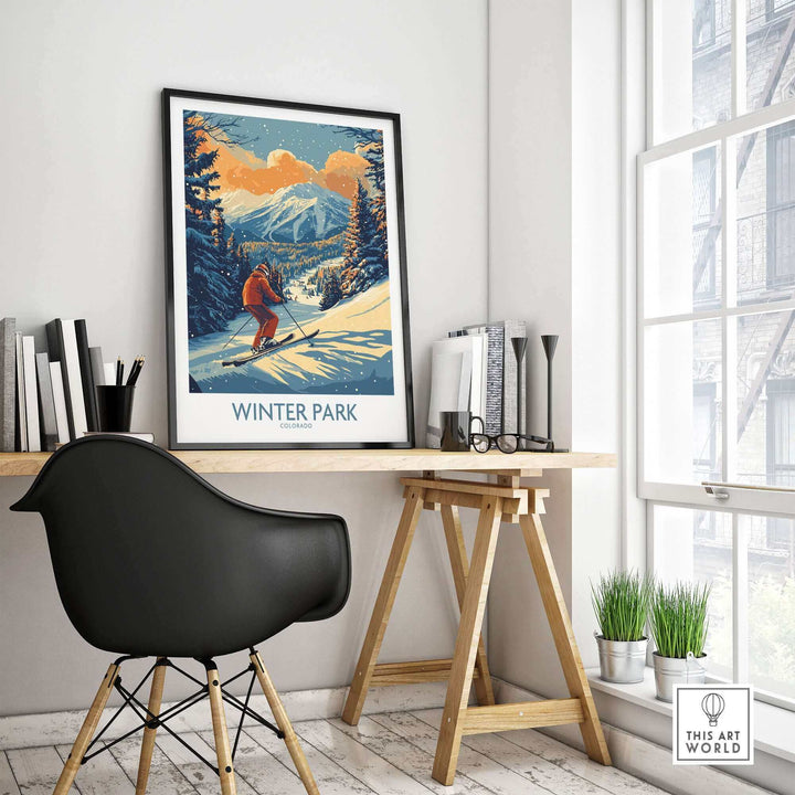 Winter Park Colorado Ski Poster displayed on a desk, showcasing a skier on a snowy mountain, perfect for ski enthusiasts.