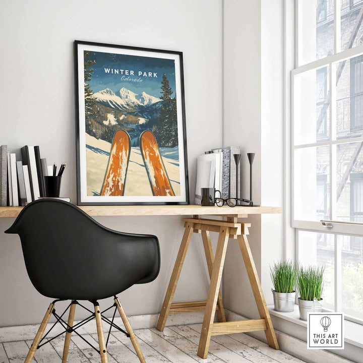 Winter Park Ski Poster displayed on desk in modern room with black chair and natural light.