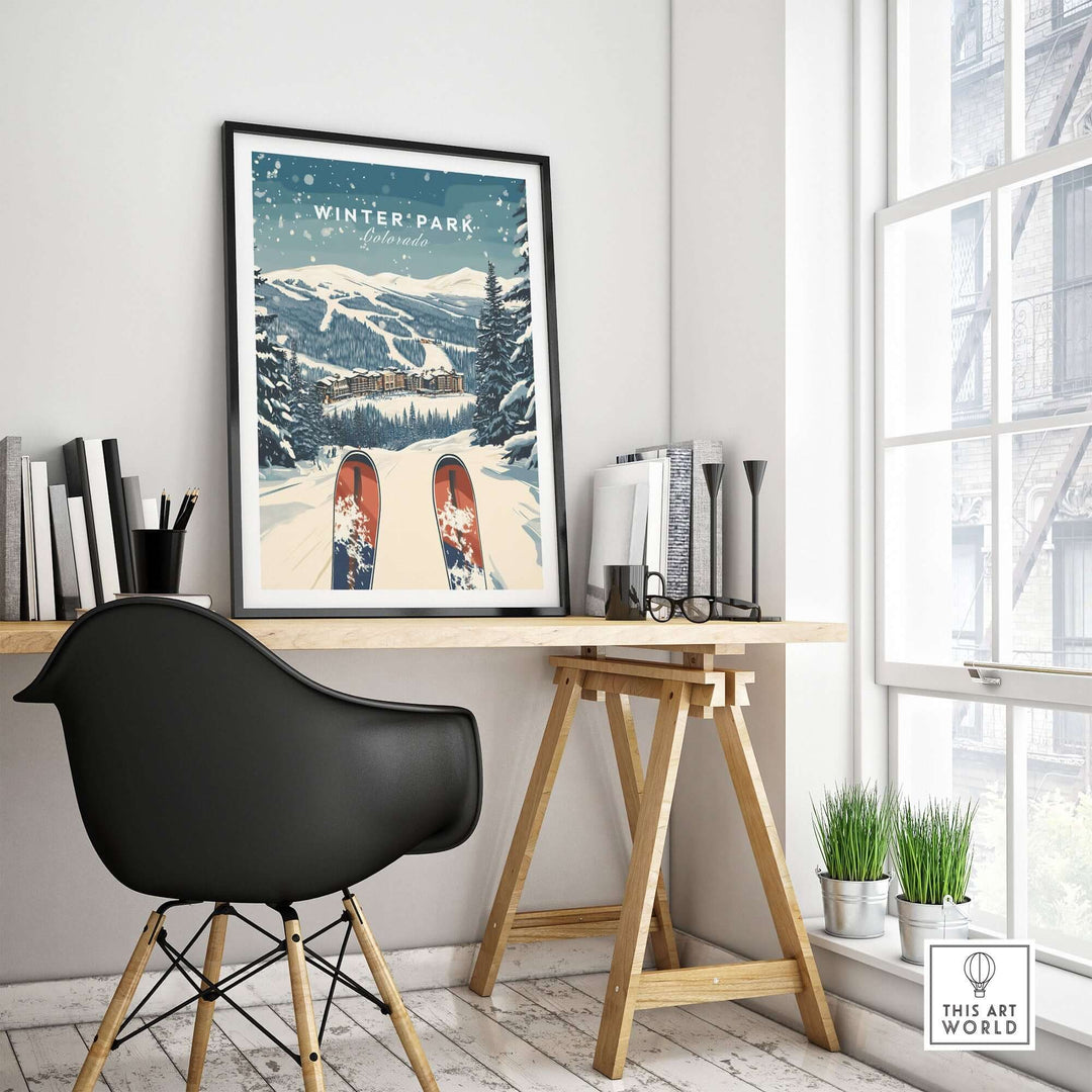 Winter Park travel poster displaying snowy mountains and skis in a modern home office setting, evoking adventure in Colorado.