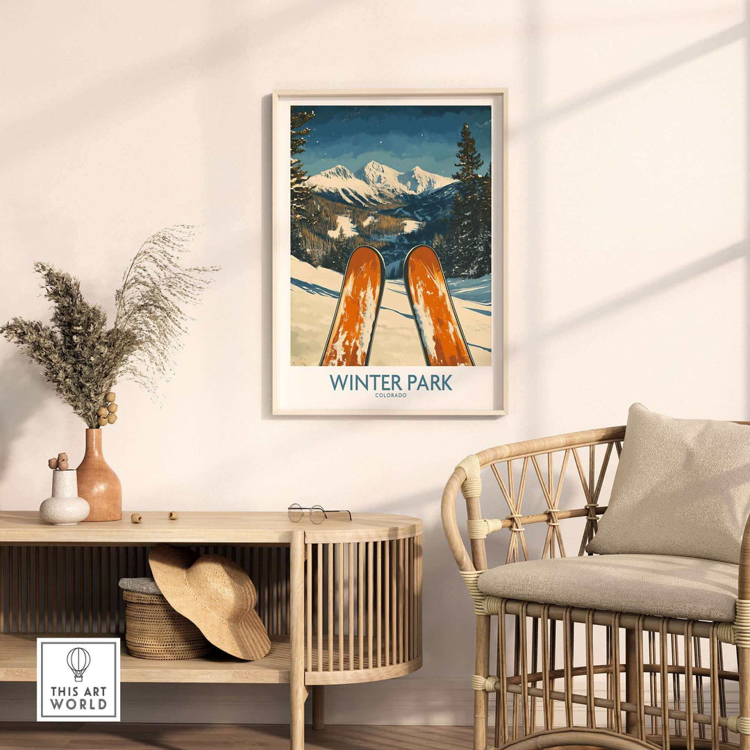 Vintage Winter Park Colorado Ski Poster Wall Art displayed in a cozy room with a wicker chair and decor.