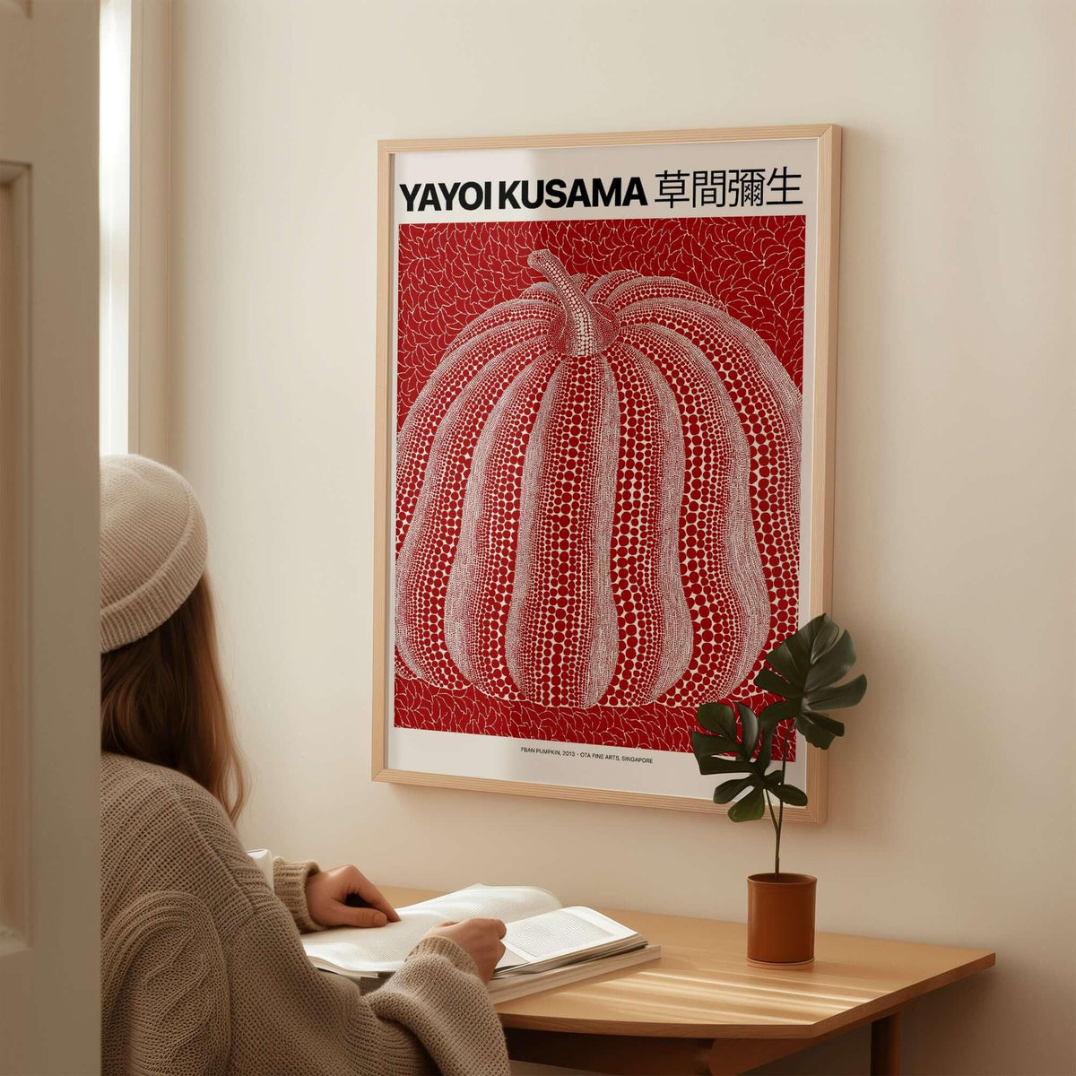 Yayoi Kusama Red White Pumpkin 2013 Singapore Exhibition Art Print Poster Polka Dot hanging on wall, person admiring it.