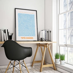 Yayoi Kusama Blue Infinity Net Pattern Abstract Art Print Paris Exhibition Poster displayed in a contemporary workspace.