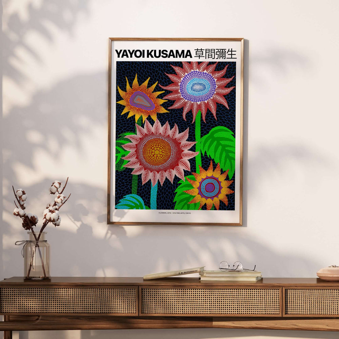 Yayoi Kusama Colorful Flowers art print featuring bright blooms and polka dots on a dark blue background.