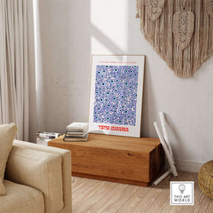 Yayoi Kusama Evil Eye Pattern Blue Contemporary Art Print Poster Paris Wall Decor displayed in a modern living room.