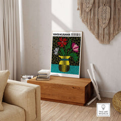 Yayoi Kusama Flowers Vase 1996 Polka Dot Art Print Contemporary Japanese Poster displayed on a wooden table in a modern setting.