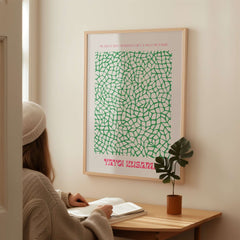 Yayoi Kusama Green Net Pattern Abstract Contemporary Art Print Paris Poster Decor displayed in modern interior with plant.