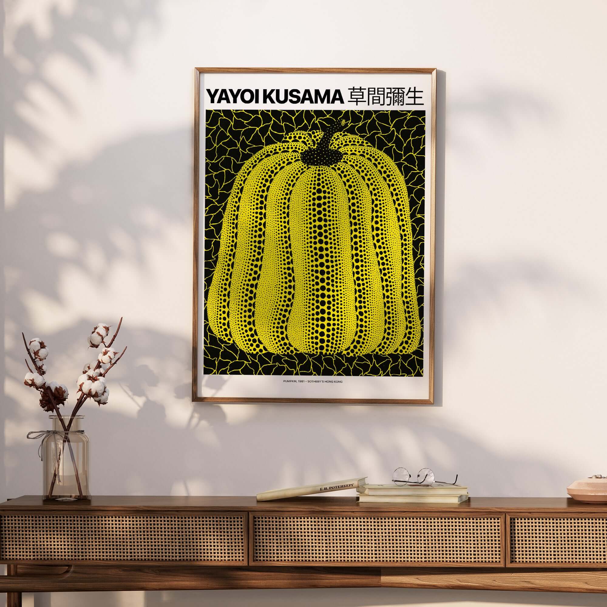Yayoi Kusama Yellow Black Pumpkin 1991 Hong Kong Art Print Poster Polka Dot Decor hanging on a wall.