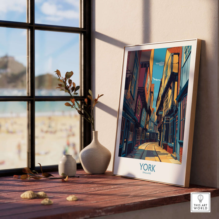 York England cobblestone street print displayed near a window, showcasing historic UK charm and character.