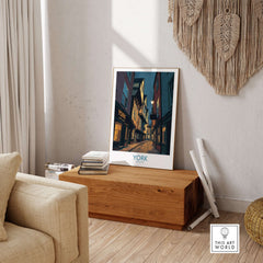 York England Historic Street at Dusk Poster - Evening Cityscape Decor displayed in a cozy living room setting.
