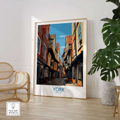 York England Medieval Alley Poster - UK Travel Destination Decor displayed in a modern living room with plants and seating.